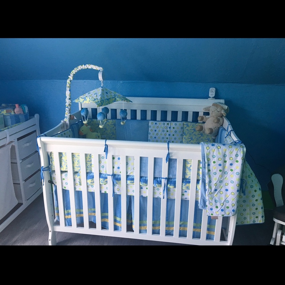 Crib w/ mattress. Changing Table and Rocking Chair. NO Accessories included